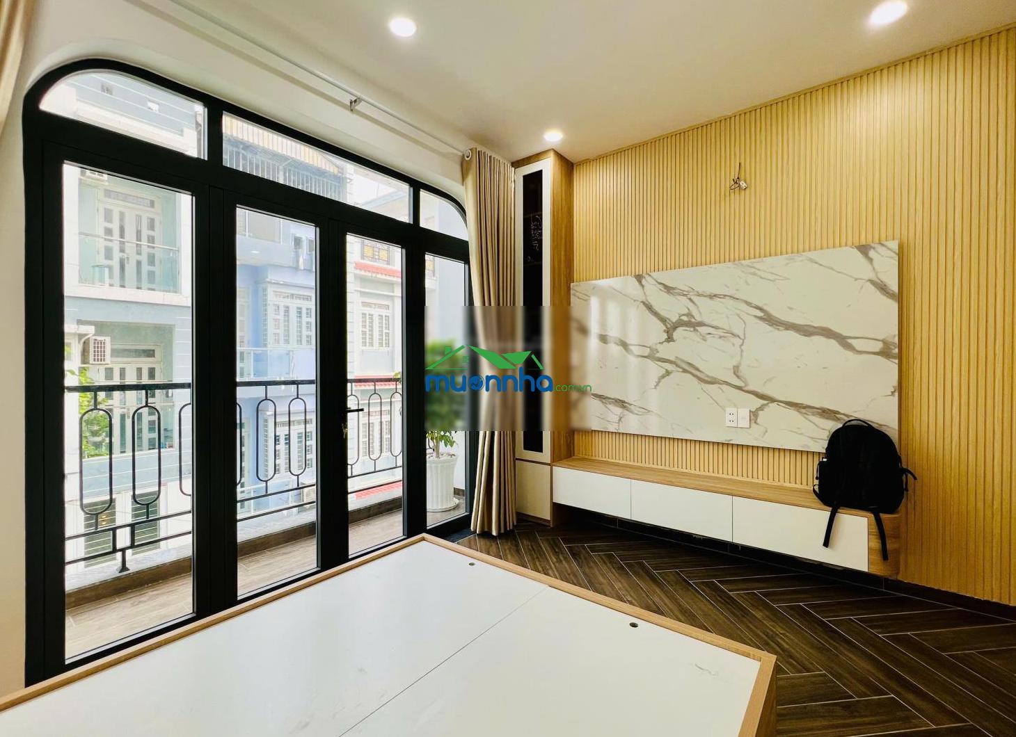 Bán nhà đường tân hòa đông (nhà 6tấm- 4m*14m- thang máy 450kg- giá 8ty3 tl) hẻm 7m gần chợ phú lâm - 4