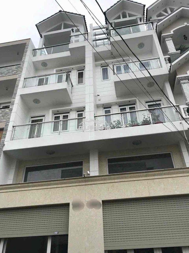 Nhà hxt mới dương quảng hàm p.5 (  1 trệt 3 lầu 5pn )