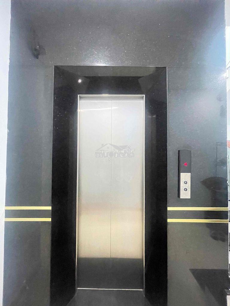Toà nhà 7 tầng bên hông phú nhuận - hầm - thang máy đường 6.5m thông - 4
