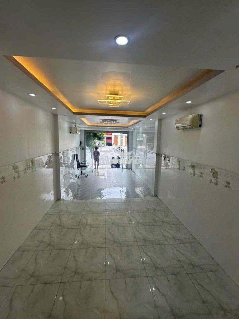 Cho thuê nhà mới mặt tiền dương quảng hàm_4 tầng_sàn thông suốt_đẹp - 3