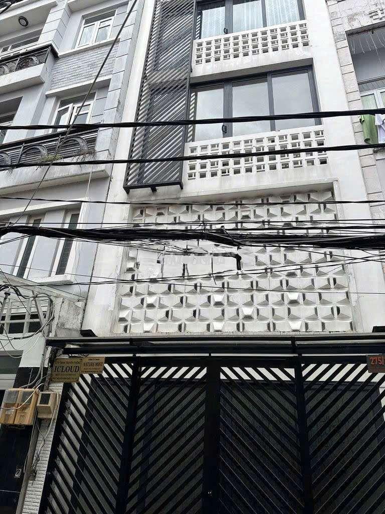 Nhà mới tt quận 3 - 1 trệt 1 lửng 3 lầu sân thượng