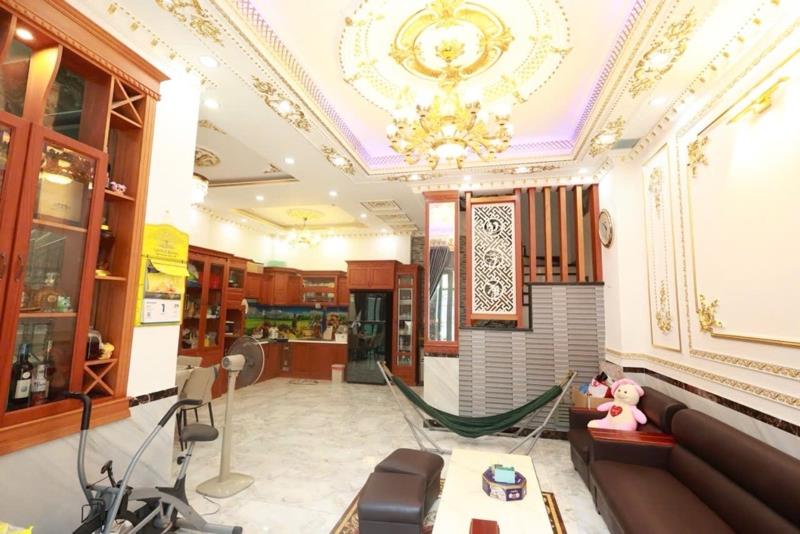 Nhà đẹp đông hưng thuận q12 – ngang 7m – gara ô tô – 4 tầng – giá 10,8 tỷ