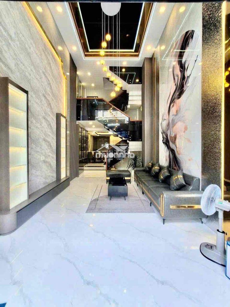 Cho thuê nhà đẹp như hình dt 4x15 1trệt 1lửng 3lầu 5pn 5wc sân thượng